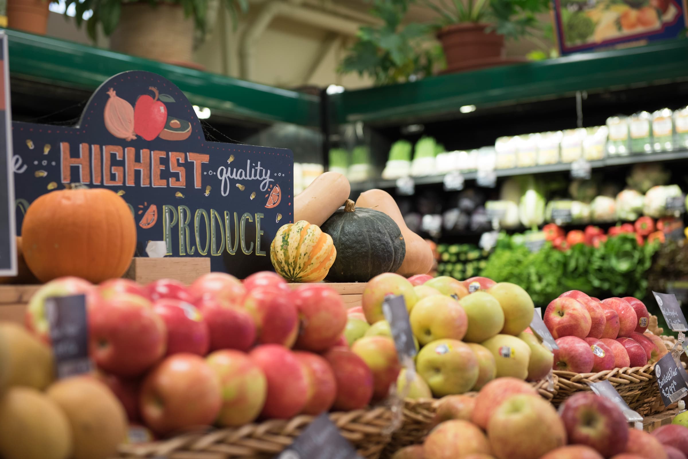 Photo of grocery store produce section showing a variety of fruits and vegetables.