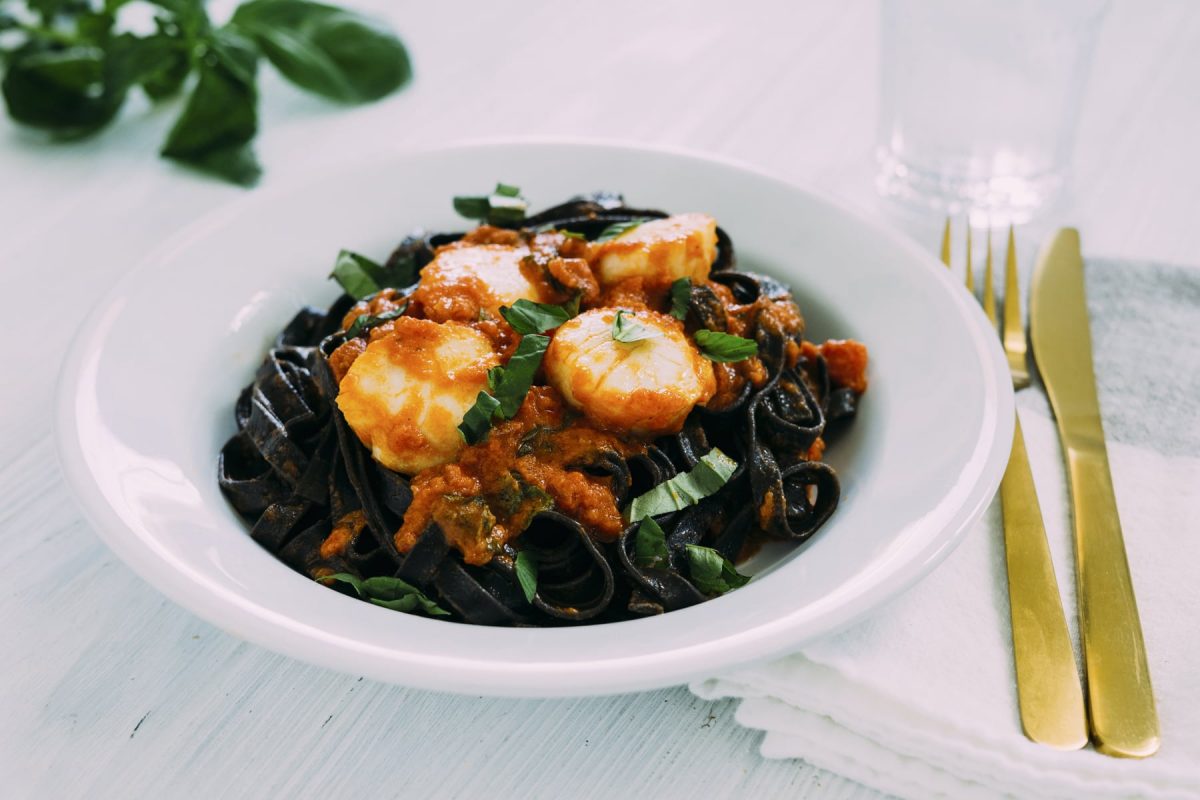 Recipe Roasted Scallops with Tomato Basil Squid Ink Linguine Dish Works